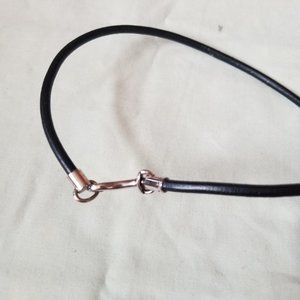 COACH black leather cord-like necklace with sterling silver fastener.  Fastener
